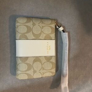 Coach Tan and Cream Wristlet